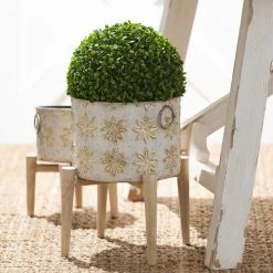 SULLIVANS White and Gold Flower Burst Metal Planter on Stand (Set of 3) 8 SULLIVANS White and Gold Flower Burst Metal Planter on Stand (Set of 3) -VIGORO Store white and gold patterned sullivans plant pots met1880 4f 1000